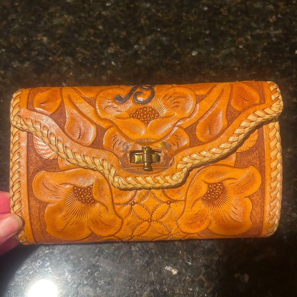 Tooled leather clutch